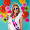Woman wearing hot pink serape sash