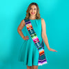 Woman wearing teal mexican serape sash