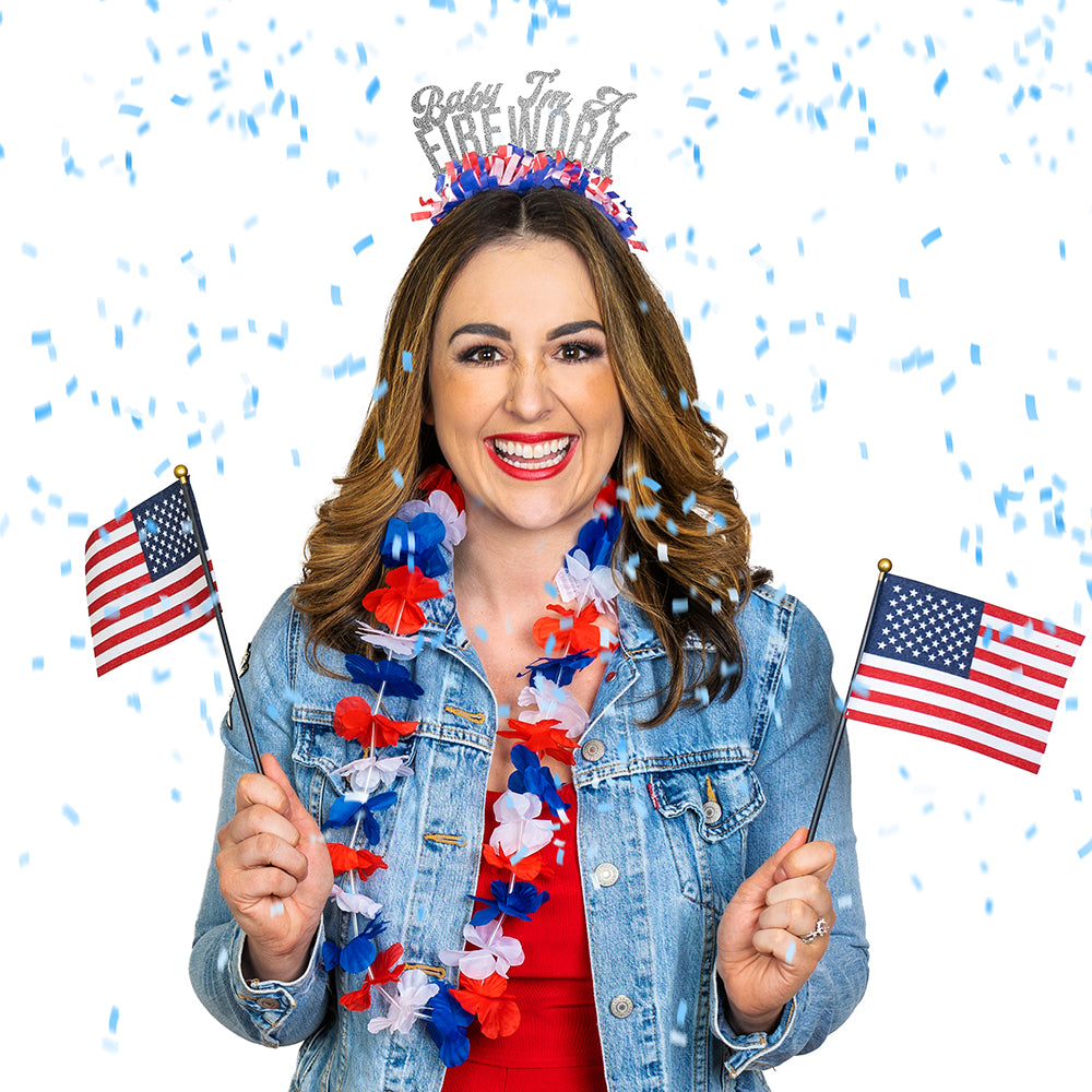 young woman wearing a 4th of July Party headband that says baby you're a firework.