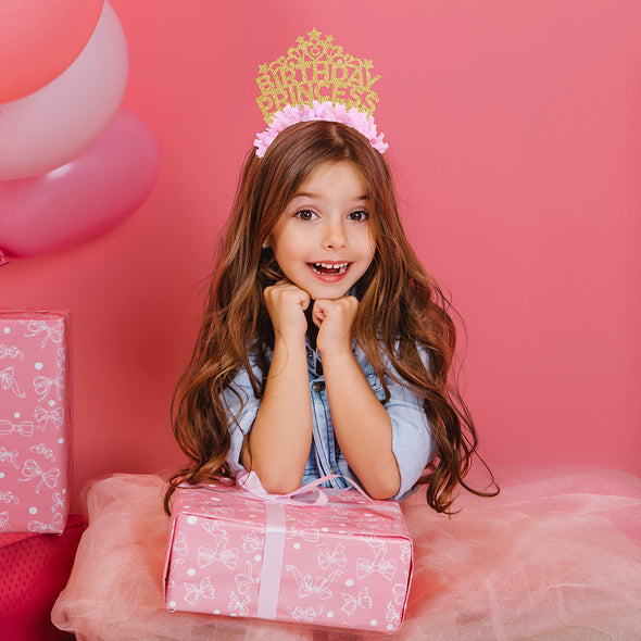 Young girl wearing Gold and pink Birthday Princess Party Headband Crown