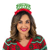 Girl dressed in Christmas sweater wearing a Green glitter party crown with red fringe saying Christmas Squad