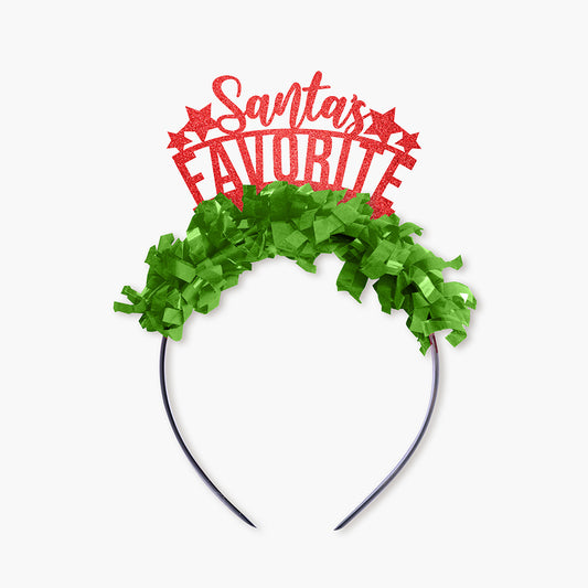 Red glitter and green fringe party crown that says "Santa's Favorite" "Santa's" is in cursive