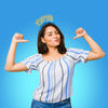 Young female teacher wearing gold and blue party crown that says "Science is my Jam". Image